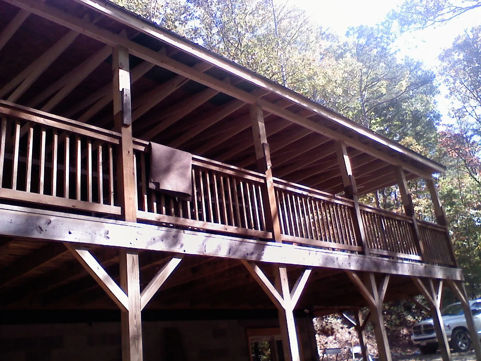 Timber framing under a new elevated porch and deck — Roof Leak Repair in Castalia by Roofing Brothers